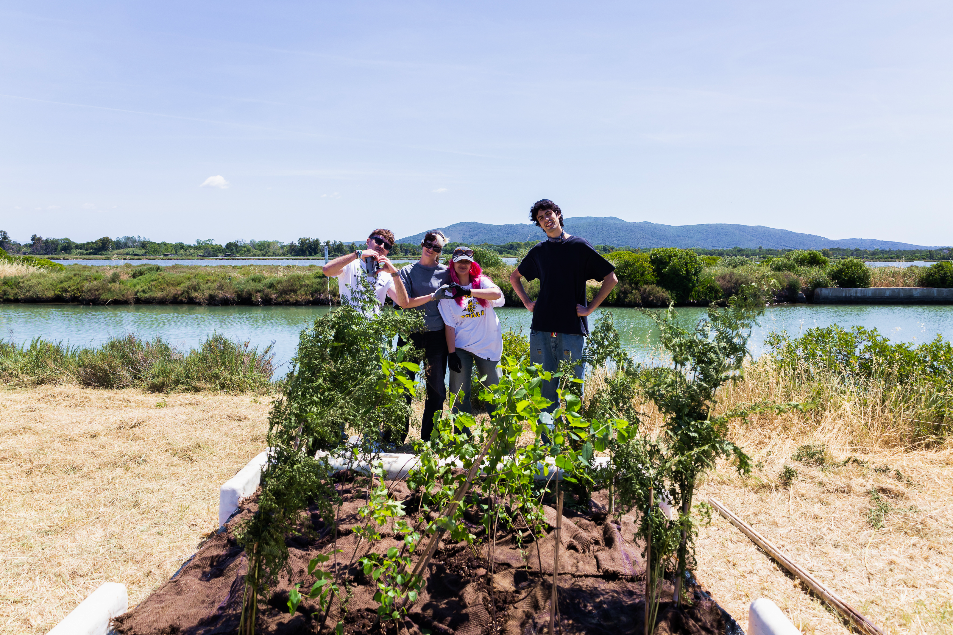 A image of a concrete sphere, balanced between two other larger spheres
